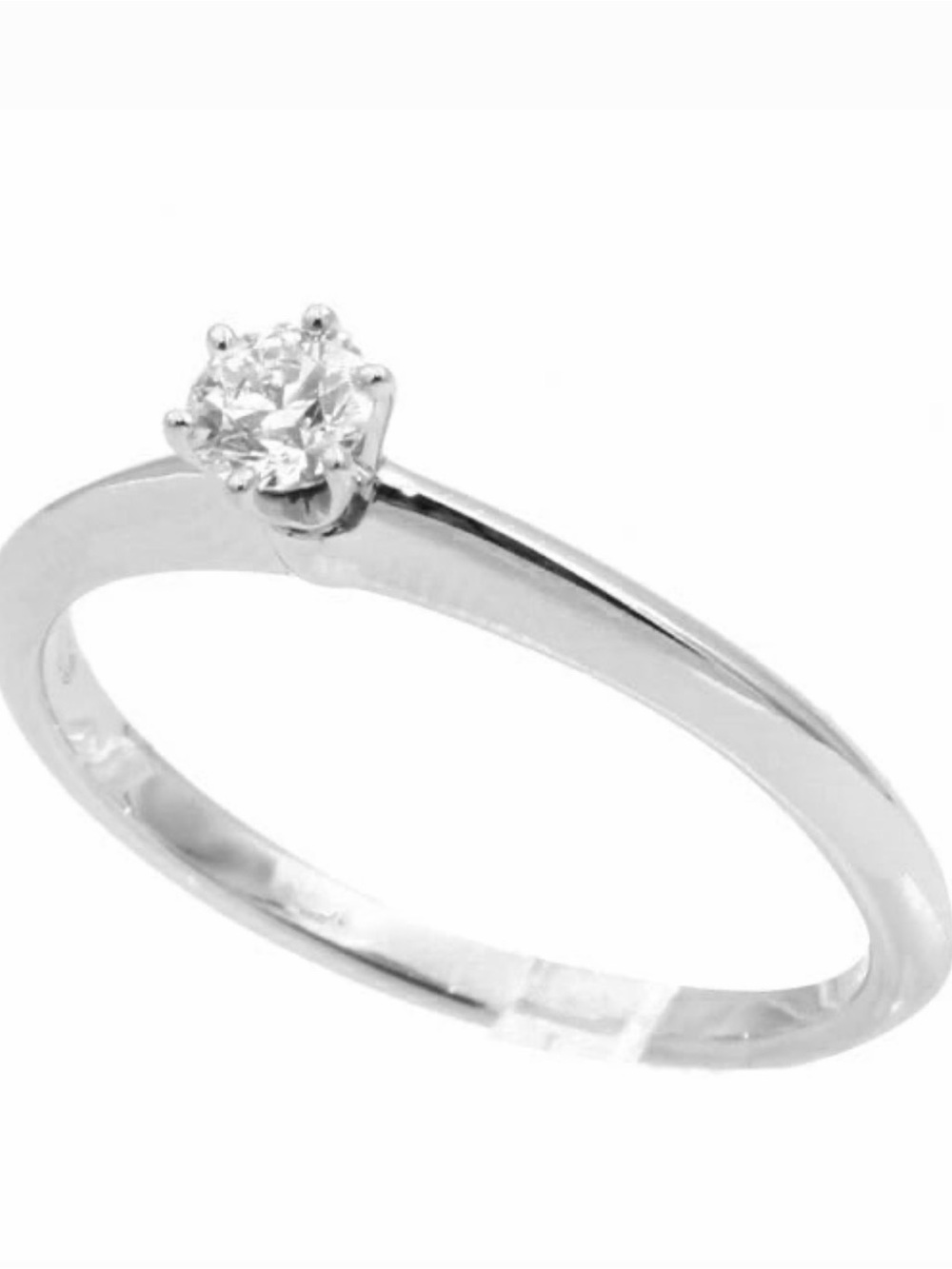 Tiffany & Co. Silver Band with  .21 carat diamond Solitaire